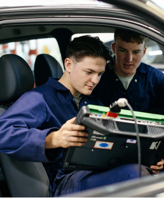 Student diagnosing car