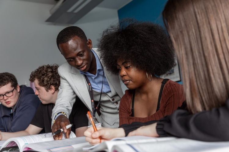 Student looking at a book
