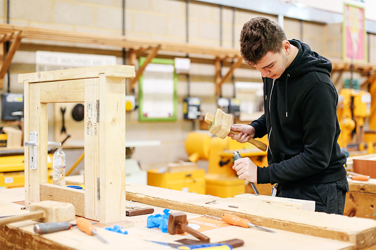 Student working on a carpentry project