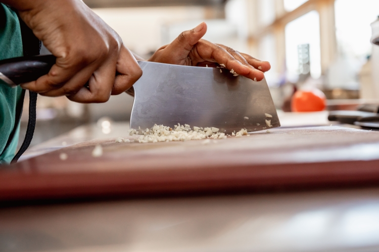Student chopping food