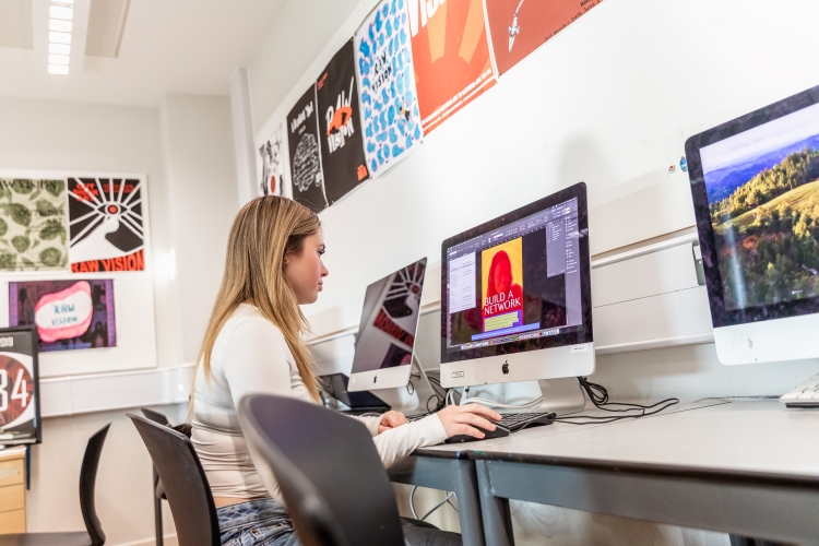 Student working on a graphic design project