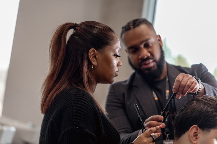 Student working on a barbering project