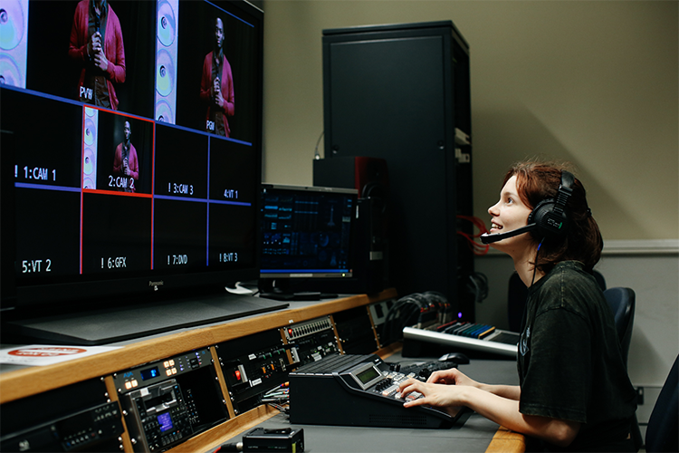 Student using film editing software