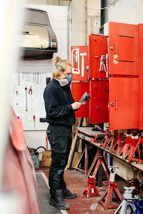 Student looking through tools