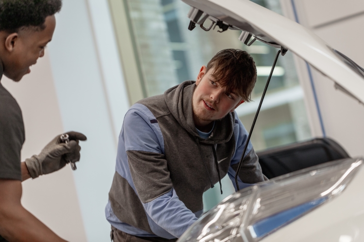 Student listening to a tutor