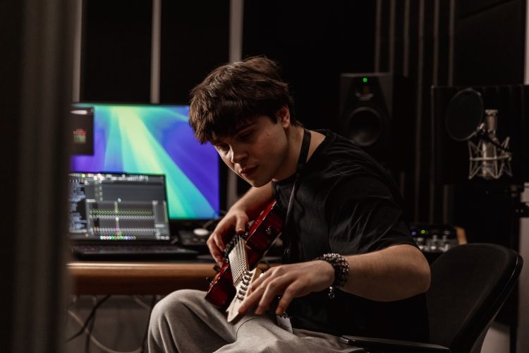 Student working on a music project