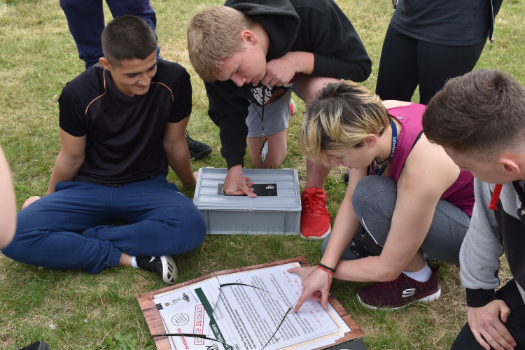 Group photo reading a document