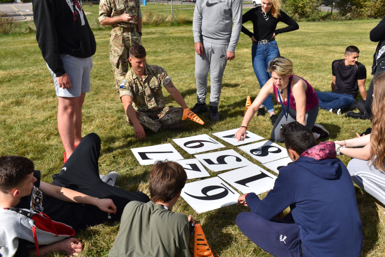 Group photo solving a puzzle