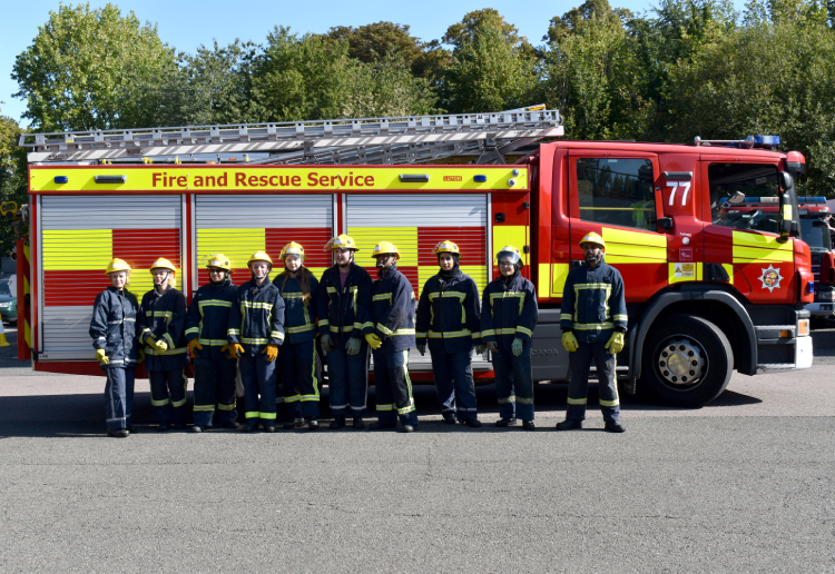 Group photo in front of fire engine