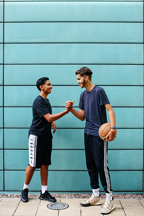 Students playing basketball