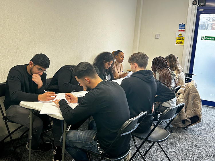 students discussing in a group