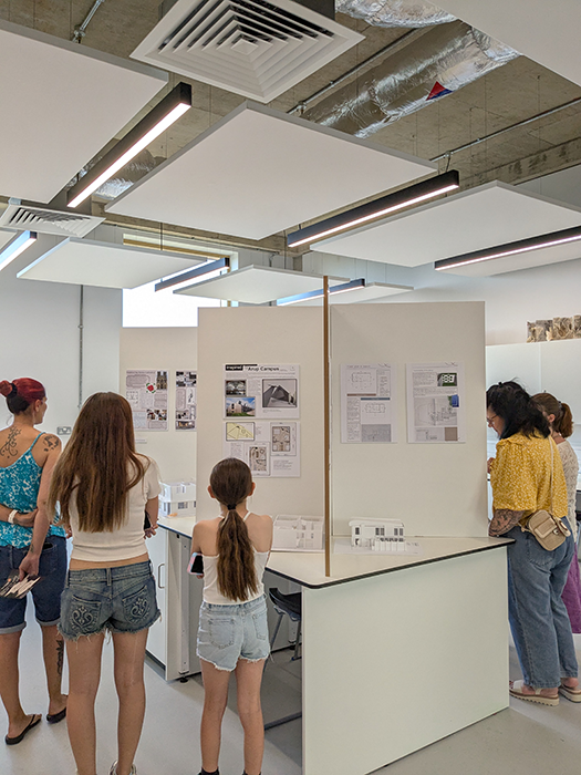 Visitors looking at exhibition