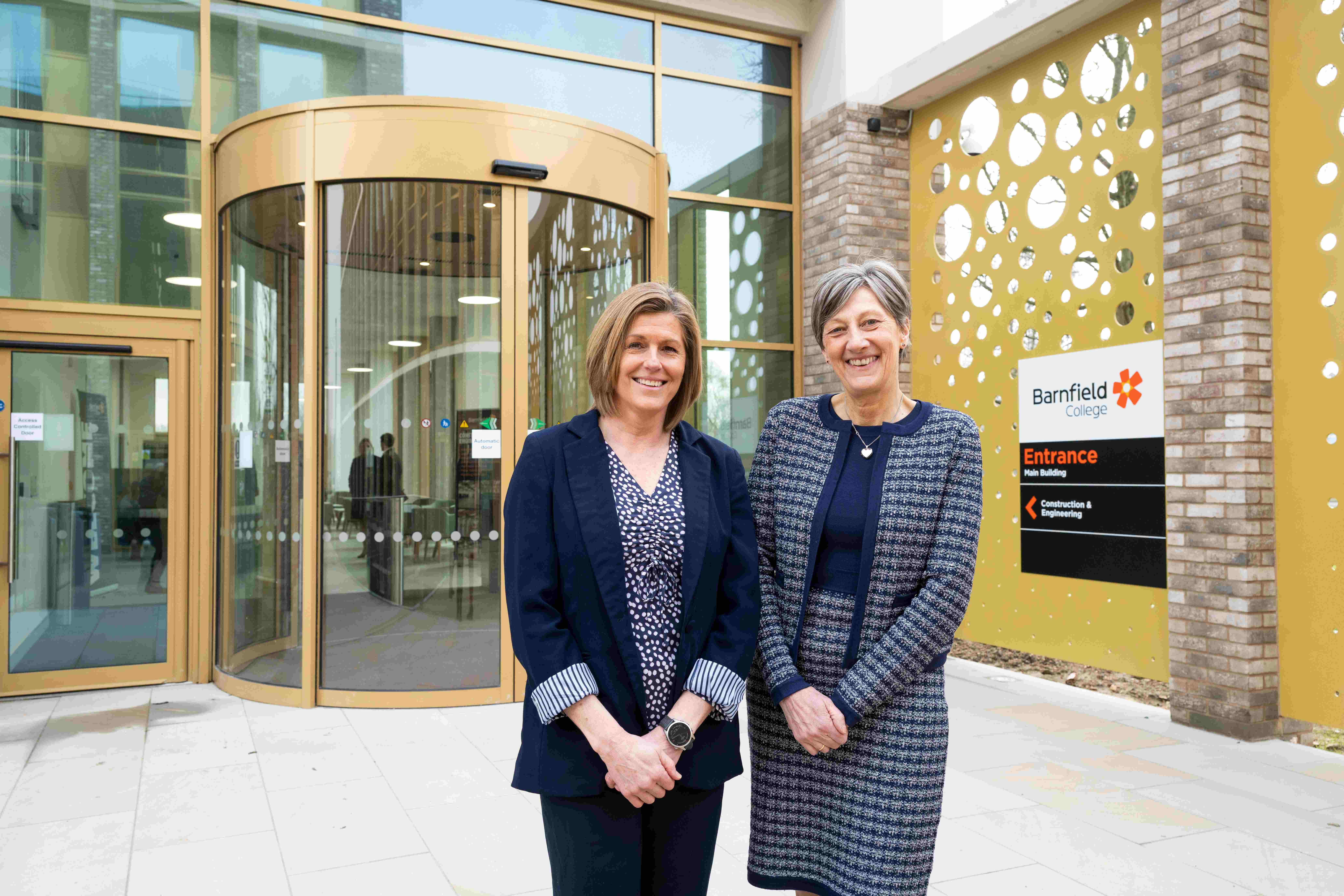 Cath Gunn and Gill Worgan outside Construction & Engineering Centre