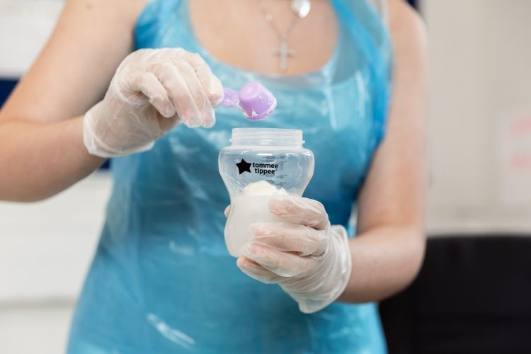 student making baby formula